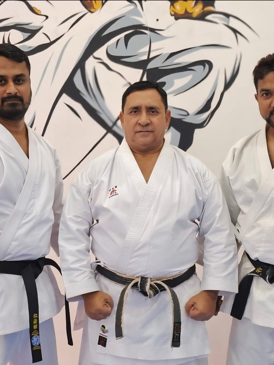 Coach Musthafa with fellow karate coaches