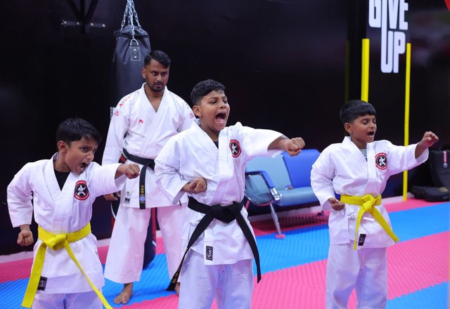 Karate students with Sensei at Al Teneen Al Ahmar